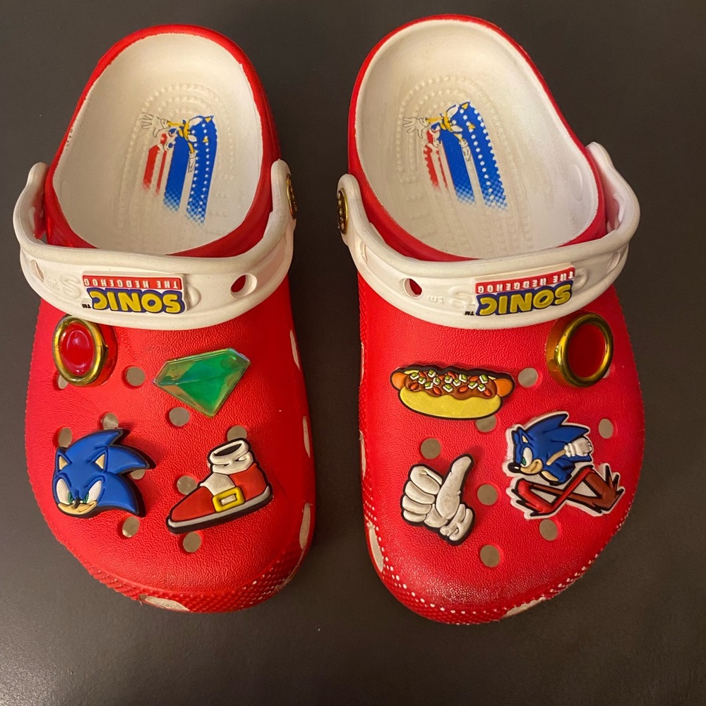 CROCS Red and White Slippers with Decorative Charms
